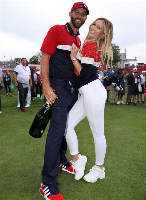 Paulina Gretzky kisses Dustin Johnson after month of celebrations