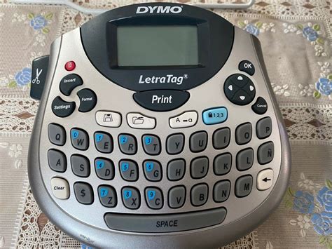 DYMO LetraTag label printing machine, Computers & Tech, Office & Business Technology on Carousell