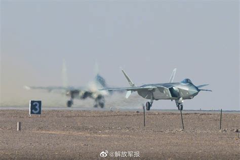 J-20 and a blurred J-16 on the tarmac [1620x1080] : WarplanePorn