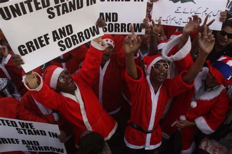 Pakistani Christians Dressed As Santa Claus Protest Taliban | HuffPost ...