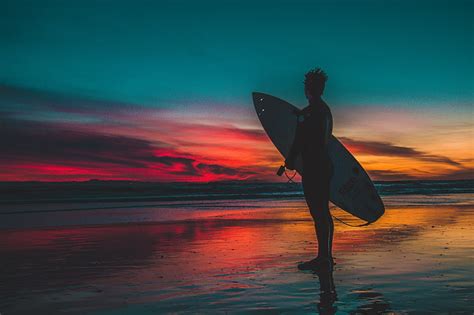 HD wallpaper: white surfboard, surfer, surfing, shore, sunset, twilight ...