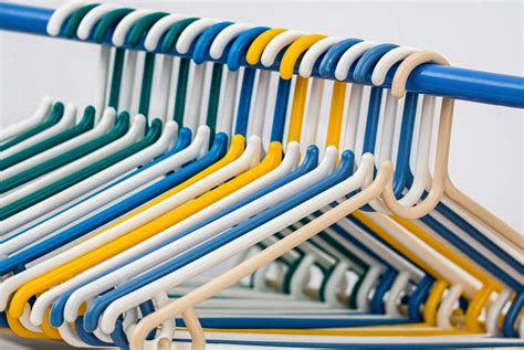 White Blue Yellow and Green Plastic Clothes Hanger · Free Stock Photo