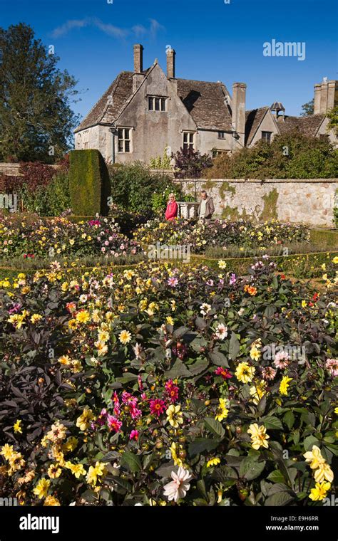 UK, England, Wiltshire, Avebury Manor, East garden formal floral planting in box hedged beds ...