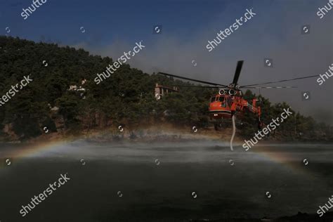 SIKORSKY S-64 SKYCRANE FIREFIGHTING PLANE APPROACHES Editorial Stock ...