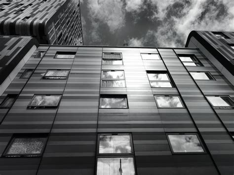 Black Concrete Building Under Sky · Free Stock Photo
