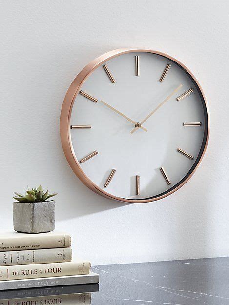 Our modern copper wall clock stays current with its warmth, metallic shine and clean lines. Pair ...