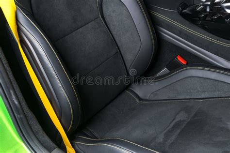 Yellow Leather Interior of the Luxury Modern Car. Perforated Yellow Leather Comfortable Seats ...