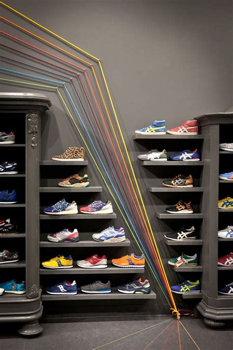 Very unique shoe wall | Shoe store design, Store design interior, Clothing store design