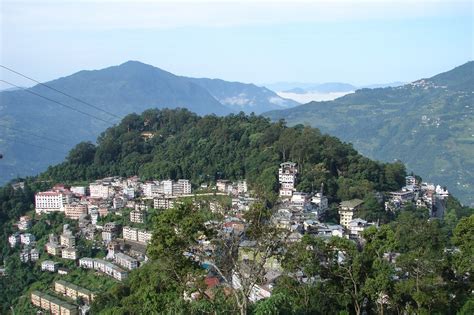 Enjoy Beautiful Serene Monasteries and Mountains with Gangtok trip | Dooars Ecoviillege