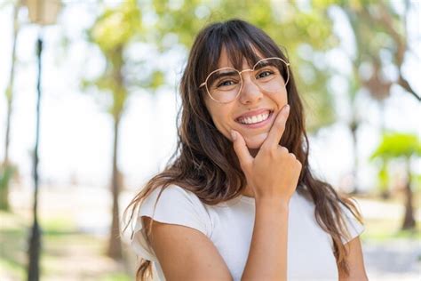 Premium Photo | Young woman at outdoors smiling