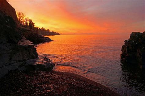 A sunrise view from the beach of Lake Superior. | Sunrise view, Places to visit, Lake superior