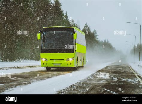 Passenger bus in Lapland road in Rovaniemi Stock Photo - Alamy