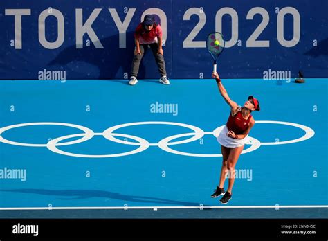 TOKYO, JAPAN - JULY 29: Belinda Bencic of Team Switzerland serves ...