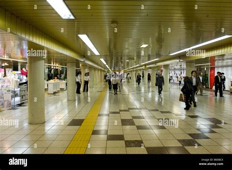 Shinjuku station at rush hour hi-res stock photography and images - Alamy