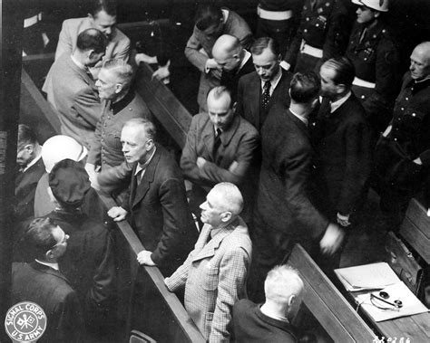 Joachim von Ribbentrop confers with counsel during War Crimes Trials in ...