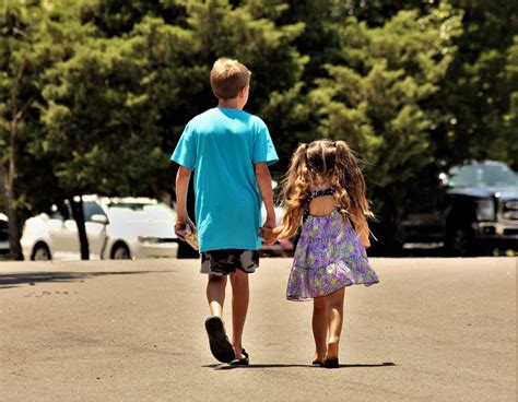 Two Children Walking Holding Hands Free Stock Photo - Public Domain Pictures