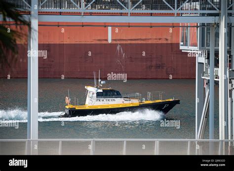 A manoeuvring boat in the port of Barcelona Stock Photo - Alamy