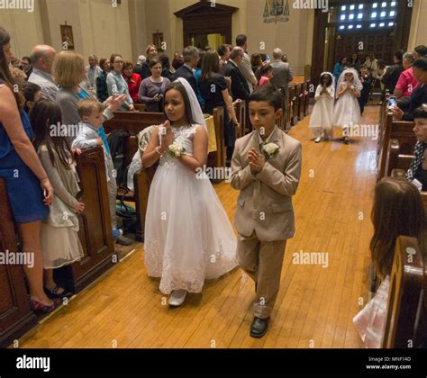 First Holy Communion ceremony for children at a Catholic Church in ...