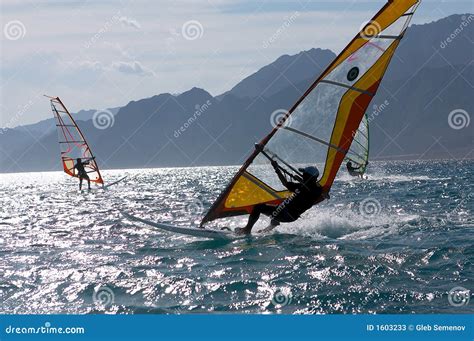 Three windsurfers stock image. Image of gust, mistral - 1603233