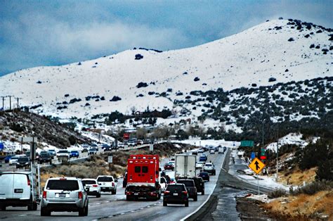 Heavy rain and snow close Southern California freeways, break record ...