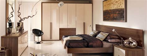 Bespoke bedroom in Dijon Walnut | Brown furniture bedroom, Contemporary bedroom furniture ...