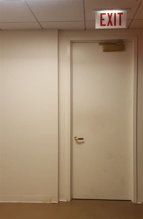 ADA Exit Door Signage Requirements: What is Wrong with This Picture?