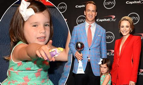 Peyton Manning's daughter Mosley clings to his leg at the 2015 ESPYS | Daily Mail Online