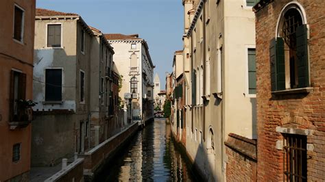 Narrow Canal With Houses In Venice Italy Stock Footage SBV-301340975 - Storyblocks