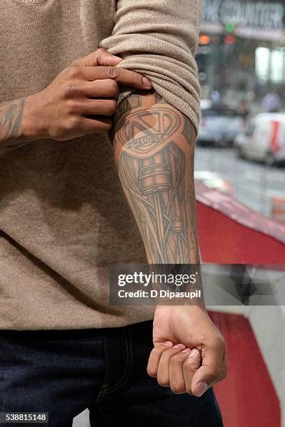 Nick Cannon Tattoo Photos and Premium High Res Pictures - Getty Images