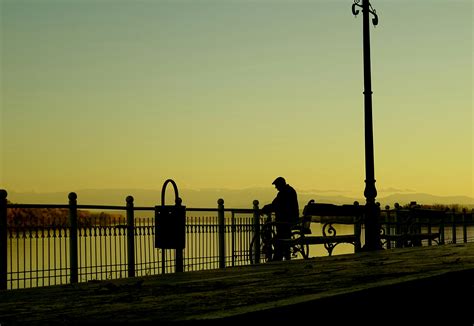Silhouette Man on Street in City at Sunset · Free Stock Photo