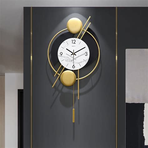 Nordic Style Golden Pendulum Distinctive Light Luxury Metal Wall Clock | Wall clock, Reloj de ...