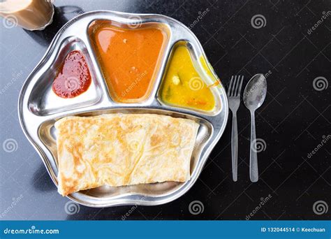 ROTI CANAI WITH CHICKEN CURRY Royalty-Free Stock Image | CartoonDealer.com #144635110