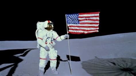 Astronaut On Moon By The American Flag