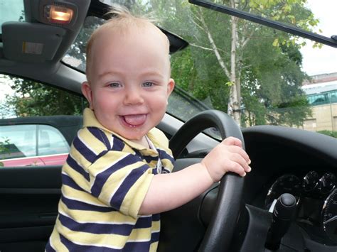 Little 2 Years Old Boy Drives A Car Free Stock Photo - Public Domain Pictures