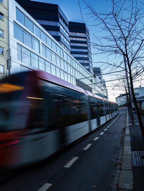 Premium Photo | Train at railroad station in city