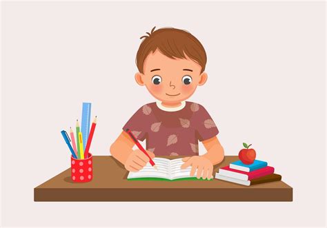 Cute little boy sitting on the desk studying writing on notebook doing his homework at home ...