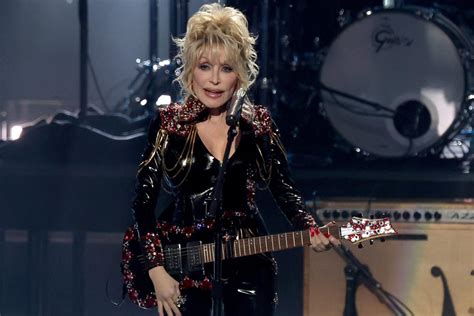 Dolly Parton performs new rock song at Rock and Roll Hall of Fame ceremony