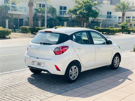 Rent a White Hyundai i10, 2022 ID-04398, in Dubai - Renty.ae