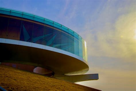 A curved building with a sky background photo – Free China Image on ...