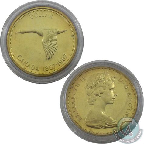 1867-1967 Canada Gold Plated Silver Dollar. This coin comes encapsulated in a green display box.