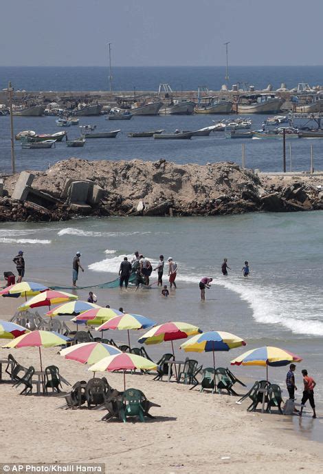 Palestinians return to Gaza City's beaches | Daily Mail Online