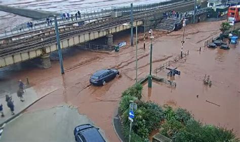 Houses destroyed and Butlin's forced to close over flooding and 'mini ...