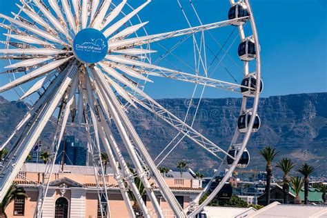 Ferris Wheel and Table Mountain View at Waterfront in Cape Town ...