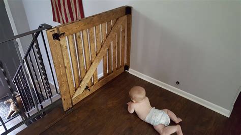 DIY Baby Gate with Cat Door in a Barn Door Rustic Style Barn Door Baby ...