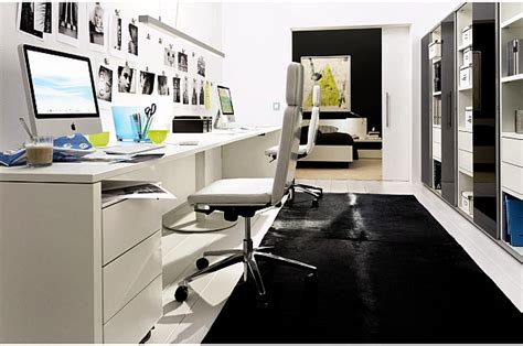 ultra modern white home office with Apple products - Decoist