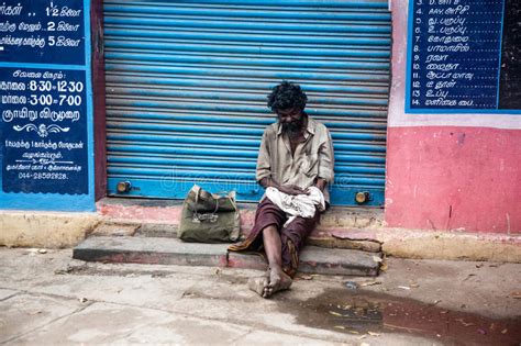 THANJAVUR, INDIA - FEBRUARY 14: Beggar Sitting On A Street Editorial Stock Image - Image: 31624224