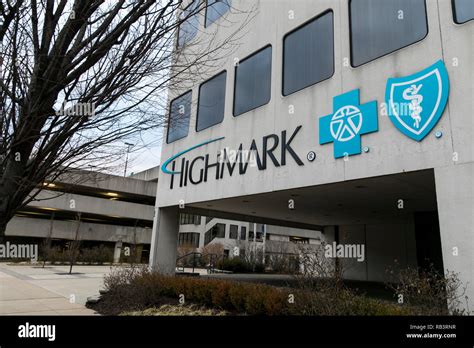 A logo sign outside of a facility occupied by Highmark Blue Cross Blue Shield in Wilkes-Barre ...