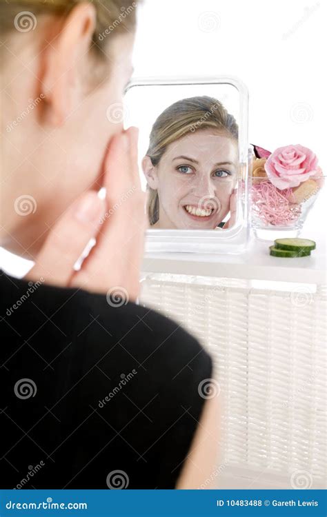 Woman Applying Facepack in Mirror Stock Photo - Image of breauty, wellness: 10483488