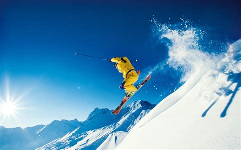 Photo of Skier Jumping Skiing in Alps - Alps Ski Vacation-1920x1200 Download | 10wallpaper.com