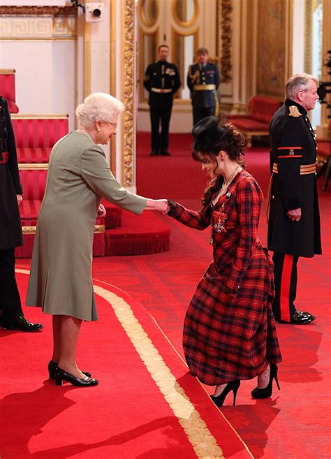 Helena Bonham Carter at CBE Medal Ceremony with Queen Elizabeth II ...